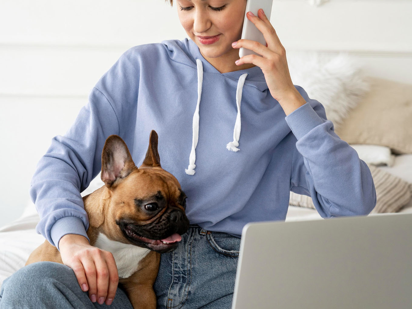 girl with phone and dog